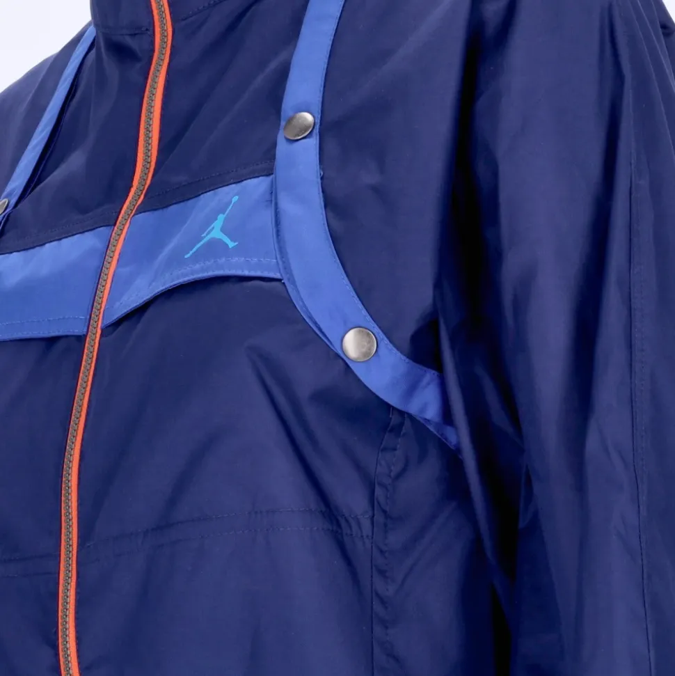 Combinaison utilitaire bleue avec cardigan détachable