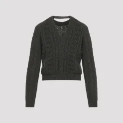 Pull court en maille torsadée